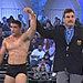 This image shows Molin officiates a made-for-television event with U.S. Olympic wrestlers.